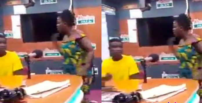 Husband receives slaps from wife inside Nhyira Fm on Mama Efe show for accusing her of keeping urine in their room