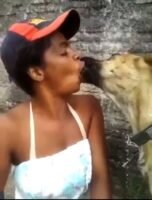 Ghanaian Lady Sleeps and Kisses A Dog In Dubai For $3,500 (Video)